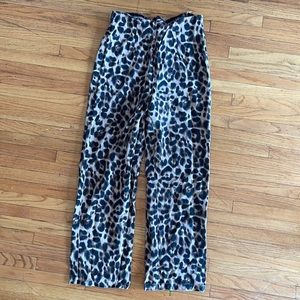 REFORMATION cheetah print pants.